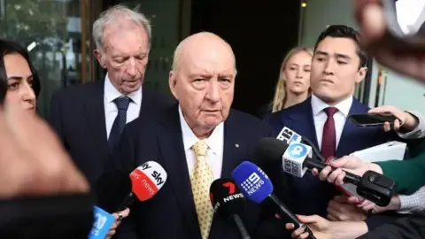 Sexual Assault Charges Against Leading Australian Media Personality Reduced